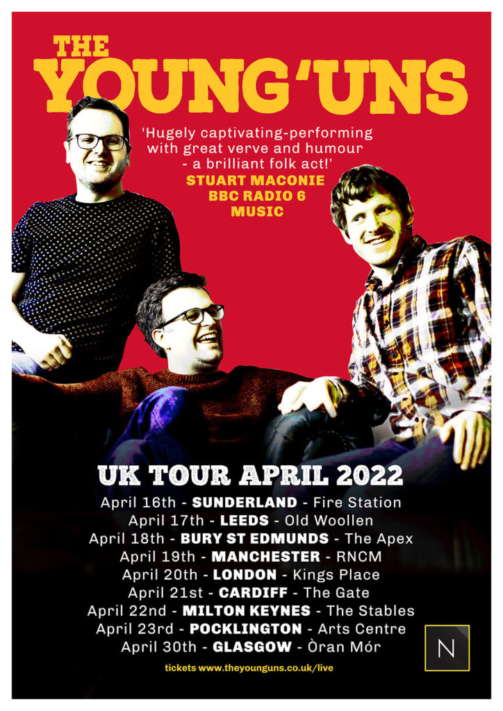 A red poster with yellow writing with a picture of The Young'uns on it.  It lists the tour dates, but it's probably easier to just jump to the link instead of listing them here. 