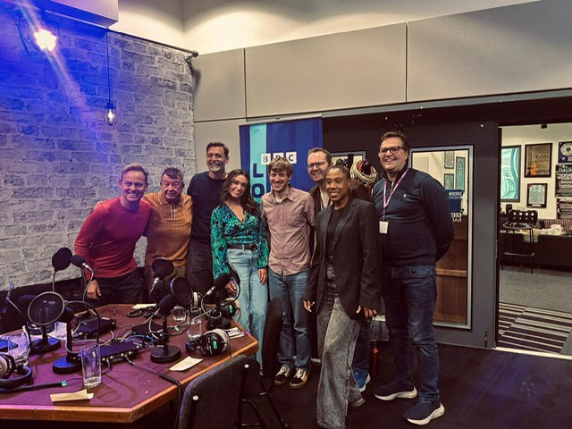A photo of The Young'uns in the studio with the other guests.